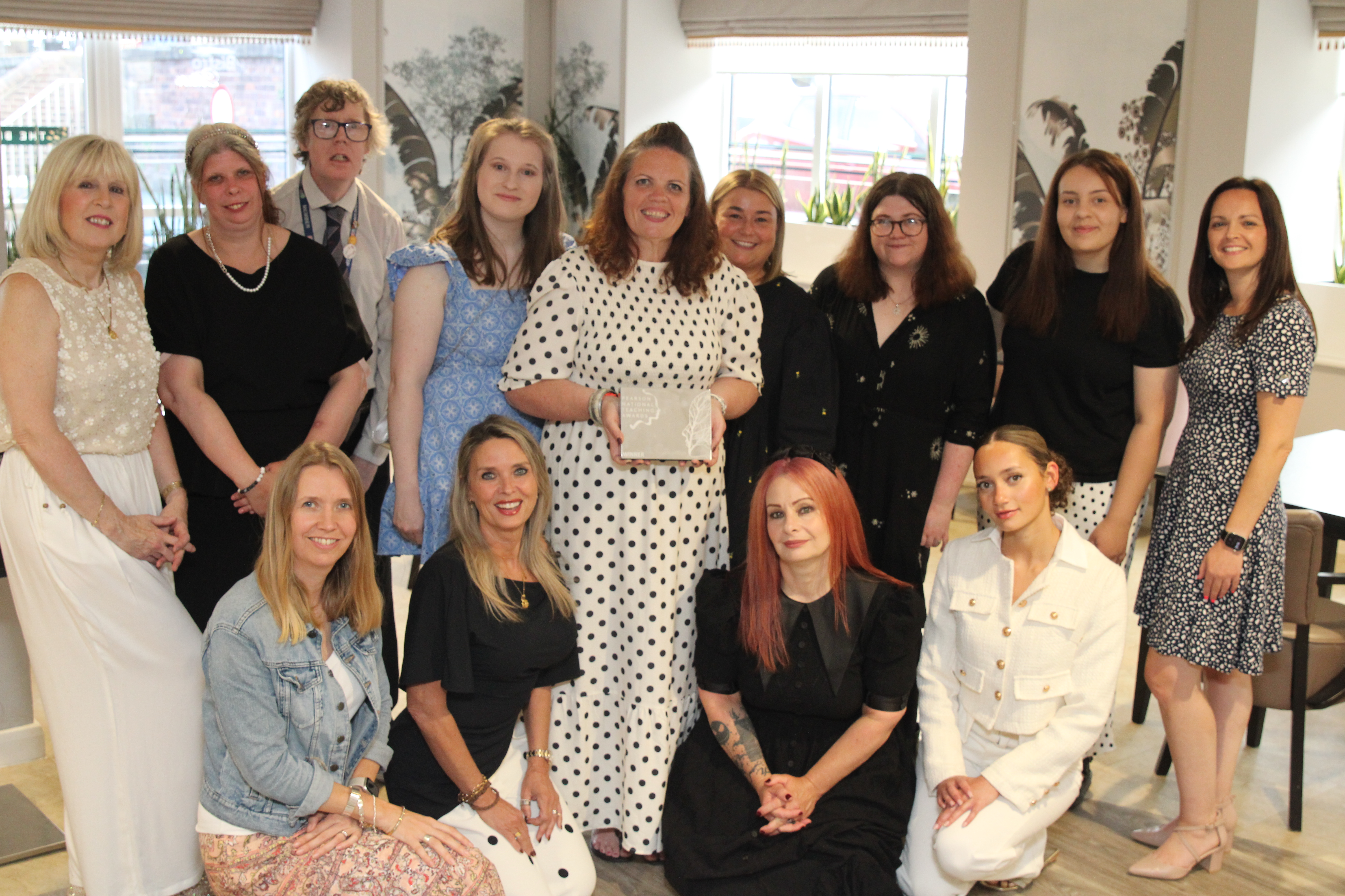 Pictured: The Ready Generations Nursery in Belong team celebrate their Pearson National Teaching Award