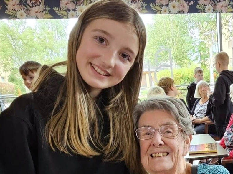 Belong Wigan's Joan Larkin makes friends with Willow Garrity 