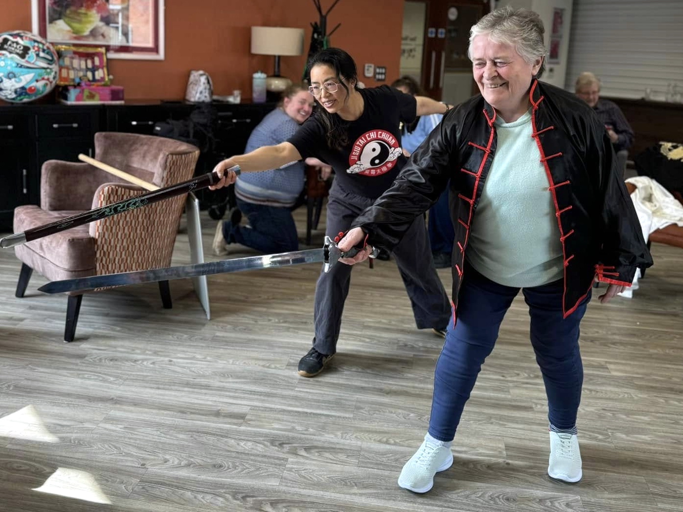 Chester - Pictured: Belong Chester resident, Maggie Darby, enjoys Tai Chi tuition under Maria Yuen of Ji Siu Chi Chuan