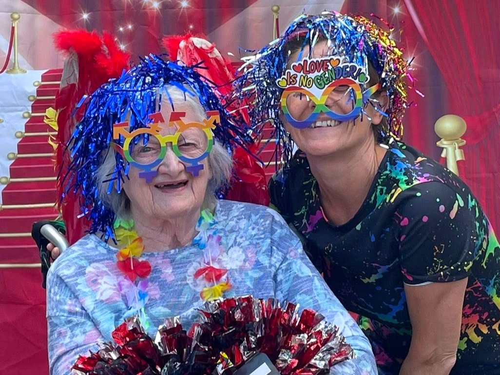 Pictured: Belong Crewe resident Jeanne Barry and support worker, Donna Woolrich, celebrate Silver Pride 