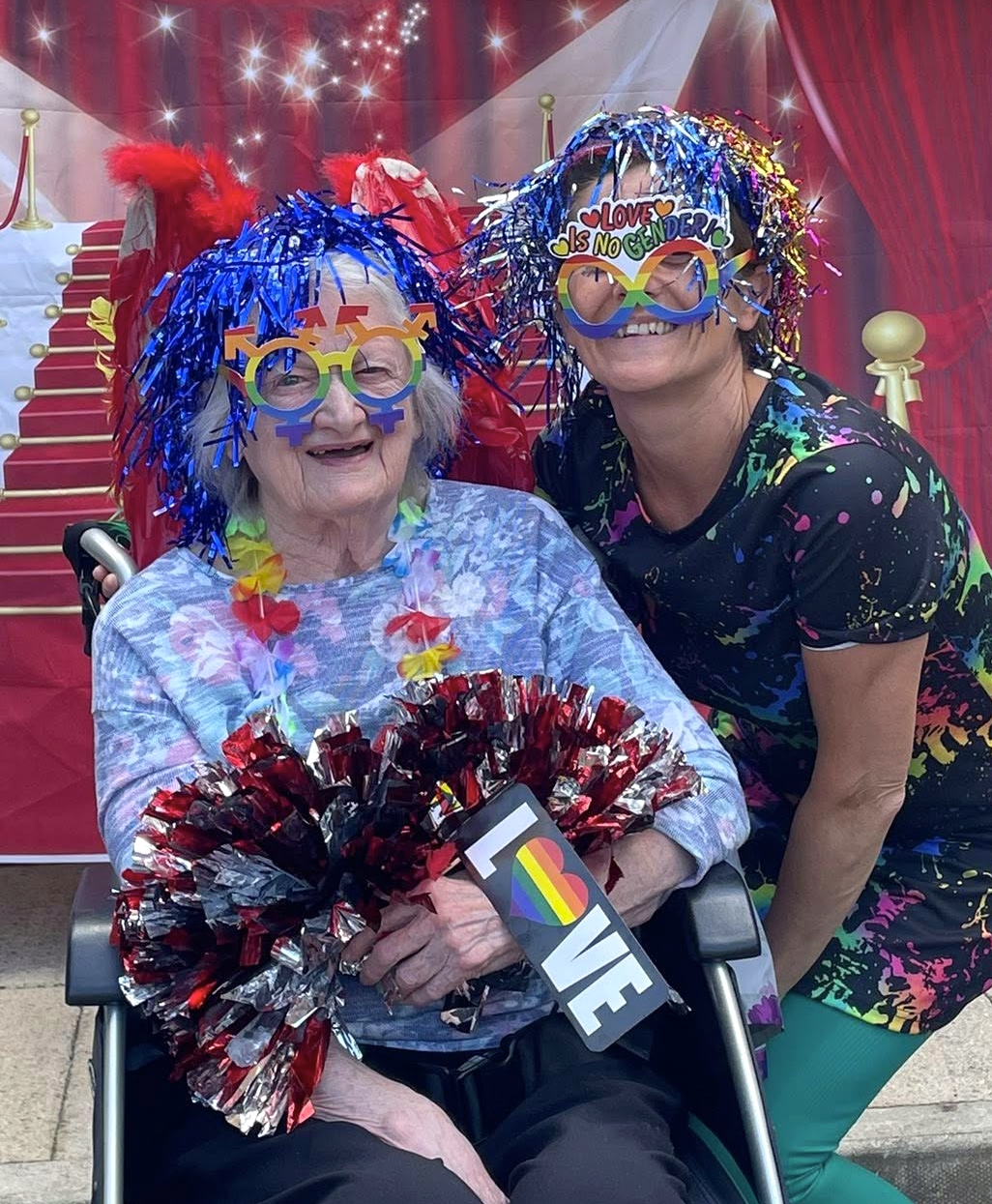 Pictured: Belong Crewe resident Jeanne Barry and support worker, Donna Woolrich, celebrate Silver Pride 