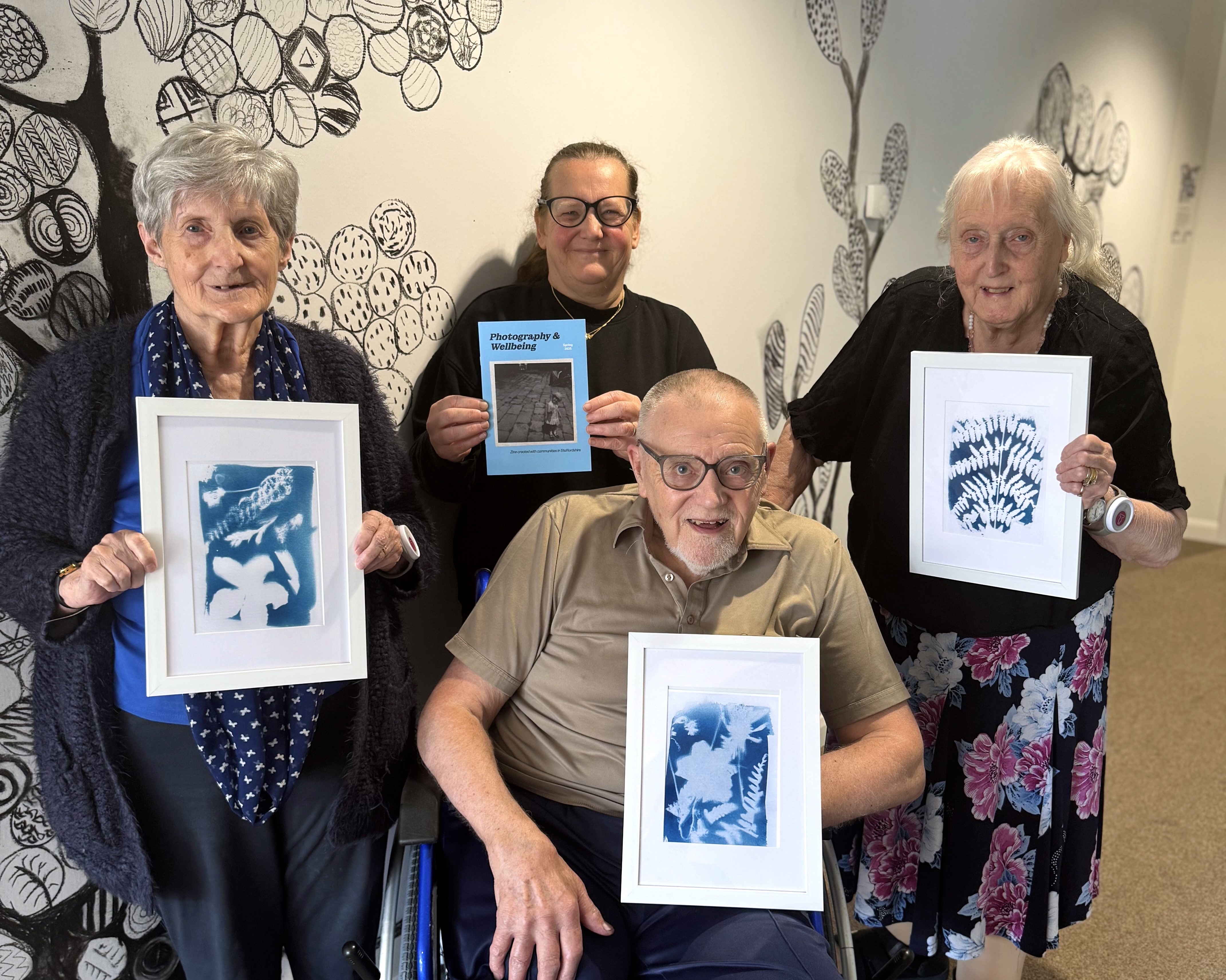 Belong customers Mary Burndrett, Georgina Cliff (Belong Newcastle-under-lyme support worker), John Yarwood, and Pauline Dawson provide a preview of the exhibition. 