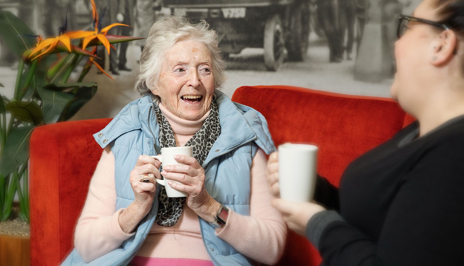 Asset - Belong Warrington - Lady with mug in the bistro