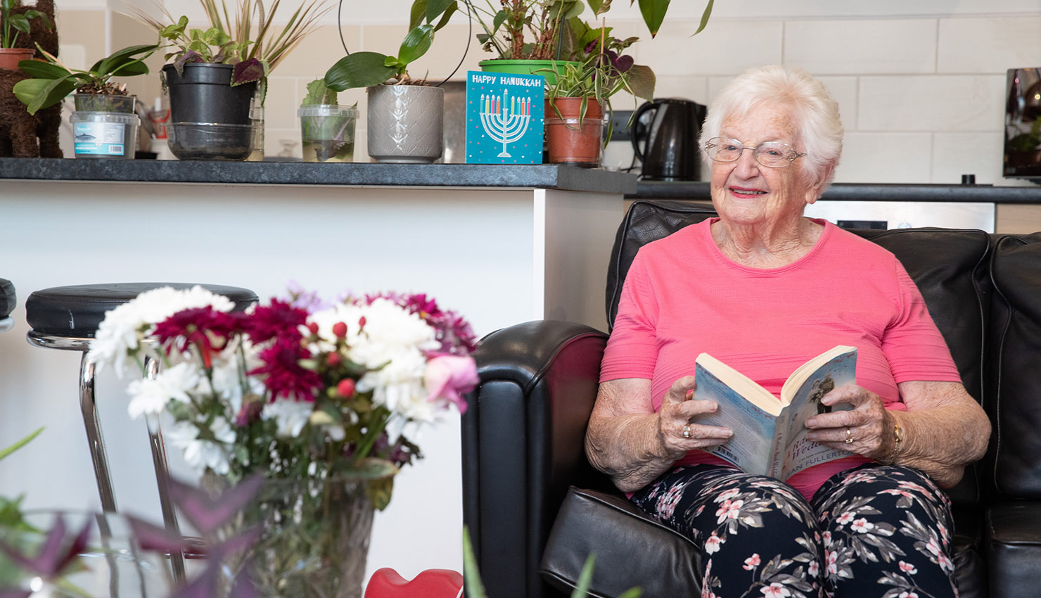 Apartment tenant reading a book