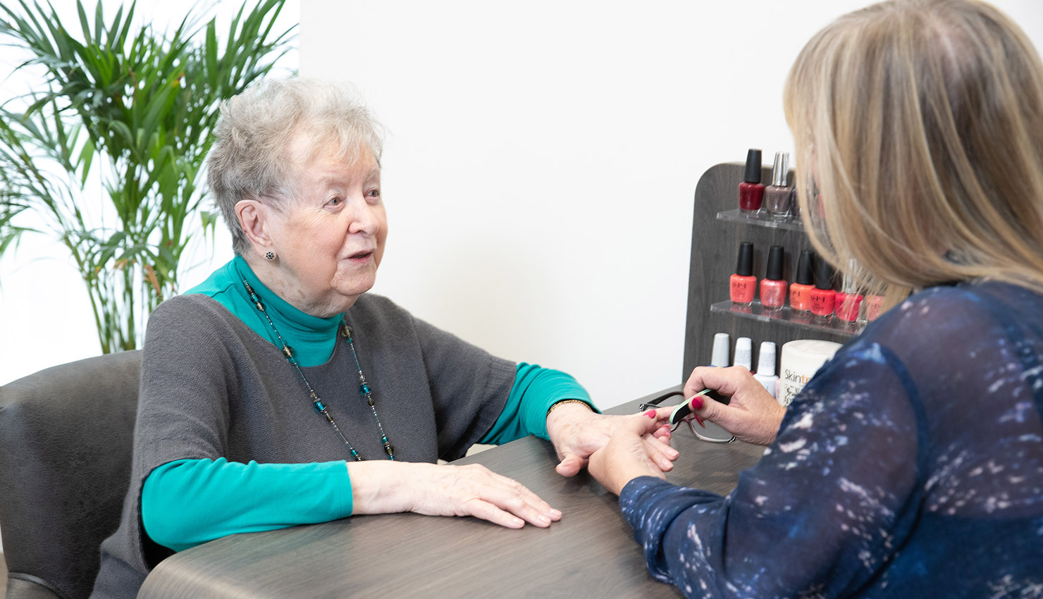 Belong Chester Resident having nails painted