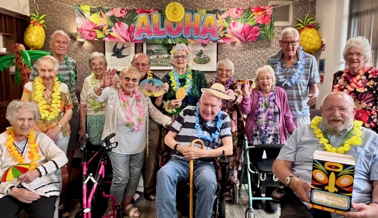 Pictured: Belong Macclesfield care village invited the community to join its Hawaiian luau