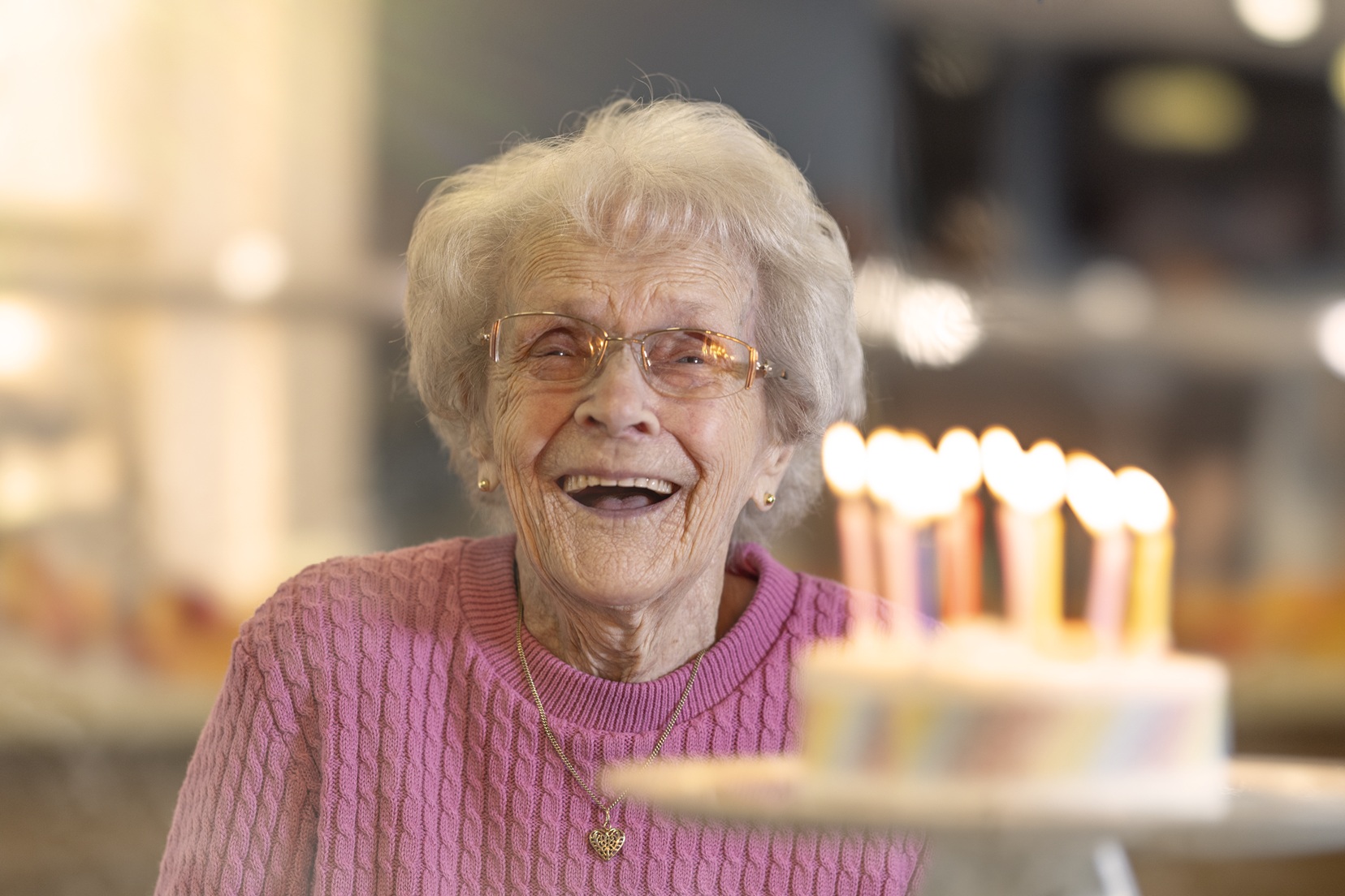 Belong Warrington Household resident playing the keyboard