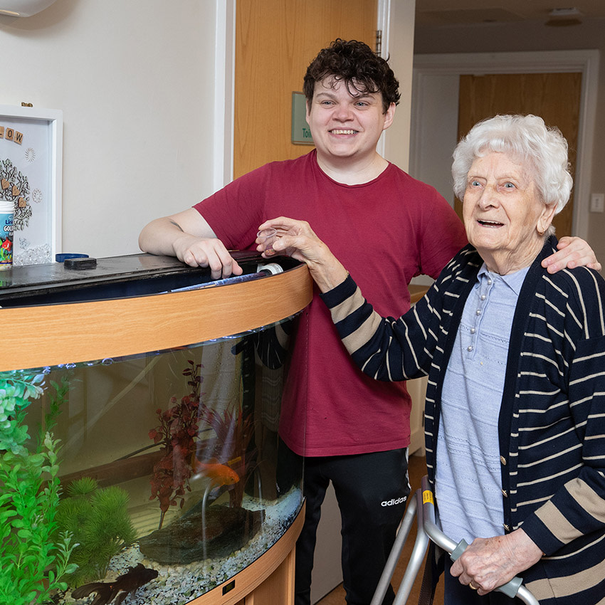 Belong Wigan household feeding the fish