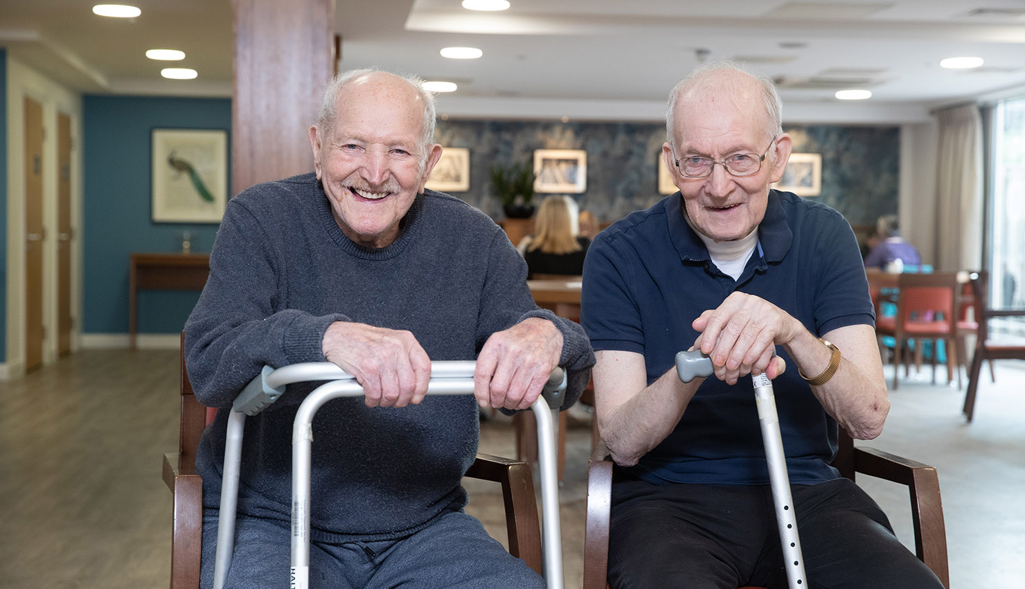 Asset - Belong Warrington - Friends in The Bistro leaning on walking aids 