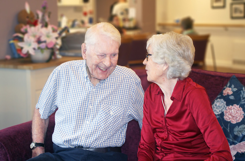 Asset - Belong Macclesfield - two residents sitting on a couch