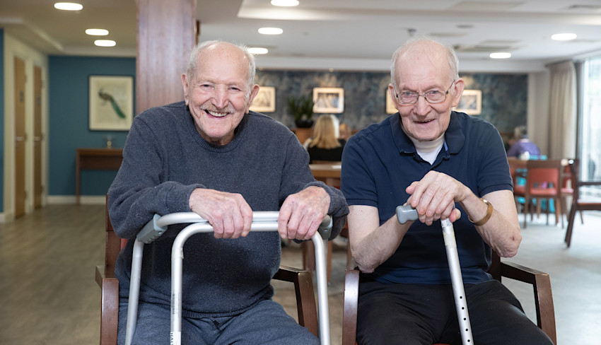 Asset - Belong Warrington - Friends in The Bistro leaning on walking aids 