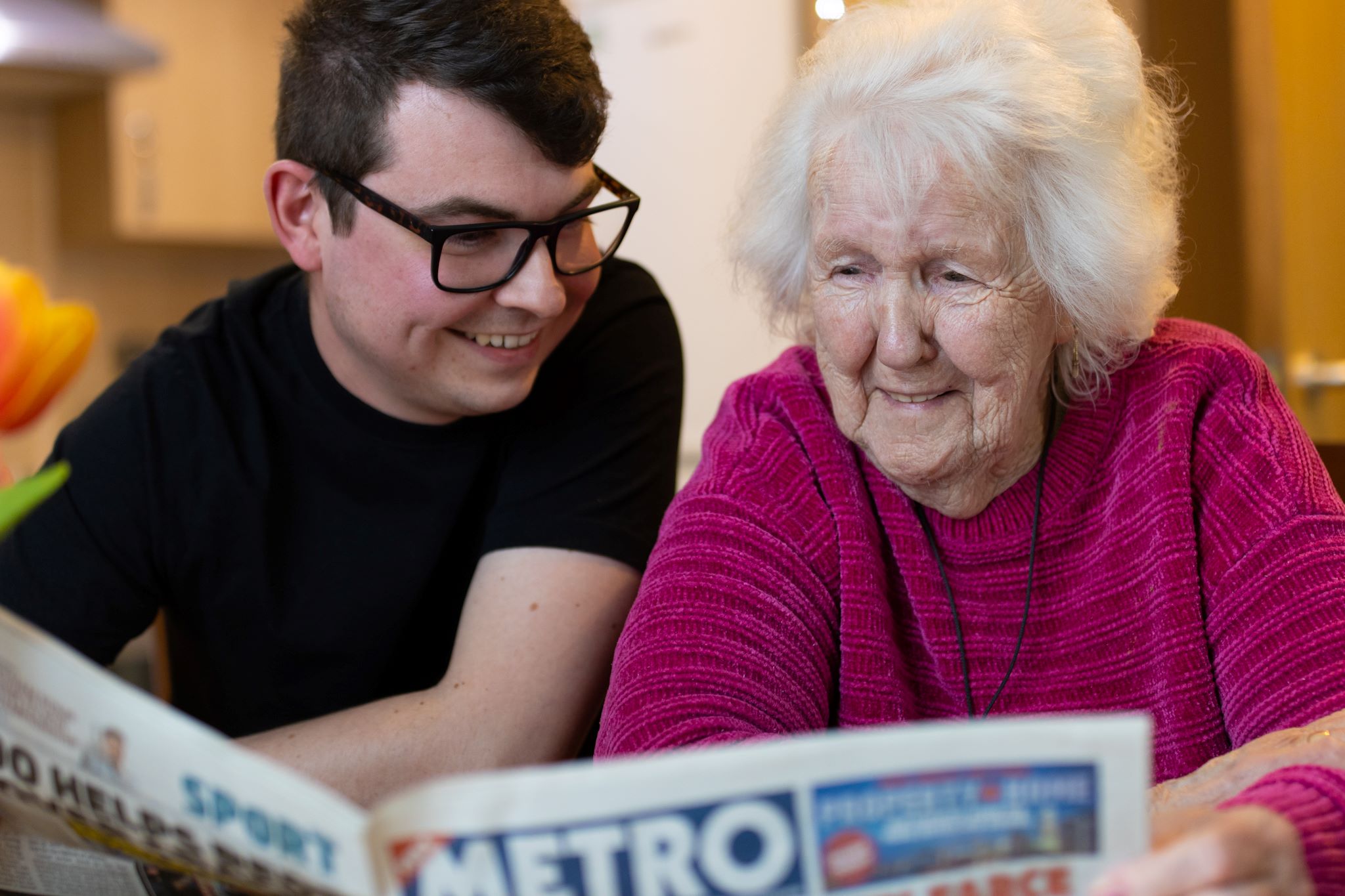 Belong at Home reading the newspaper