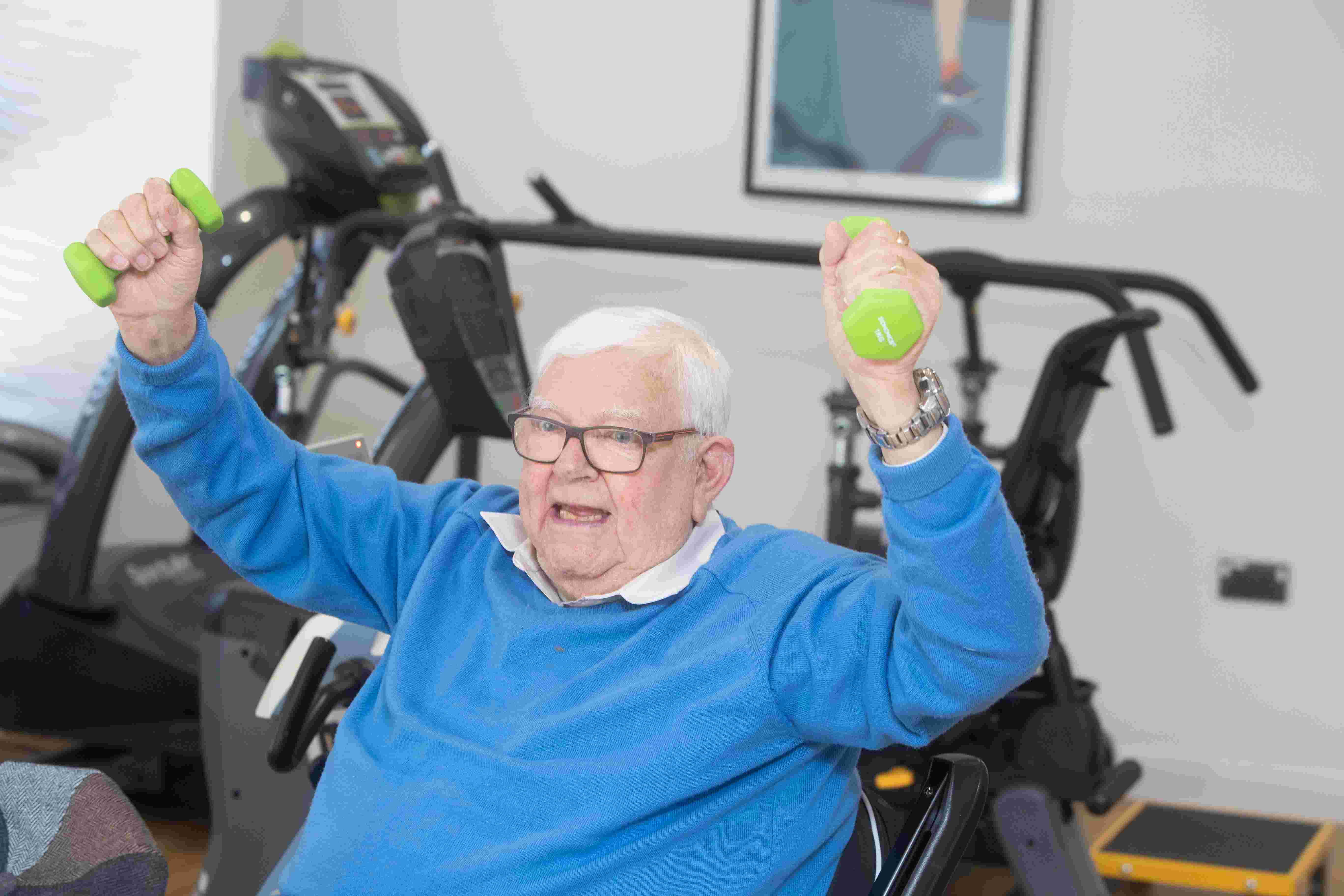 Asset - Belong Chester - customer with dumbbells