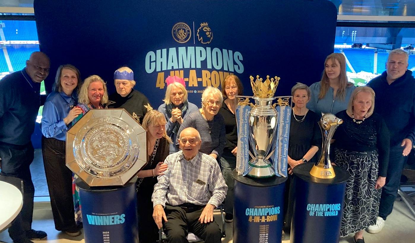 Asset - Blue fans from Belong Morris Feinmann care village mingle with former Man City stars 