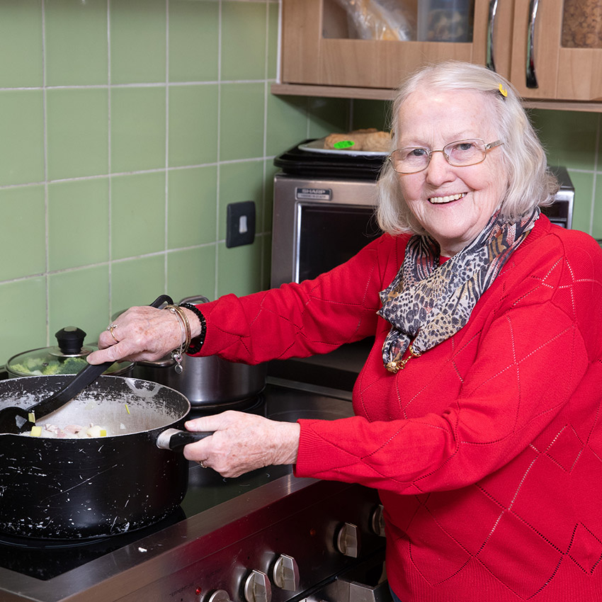 Belong Atherton cooking on a Household