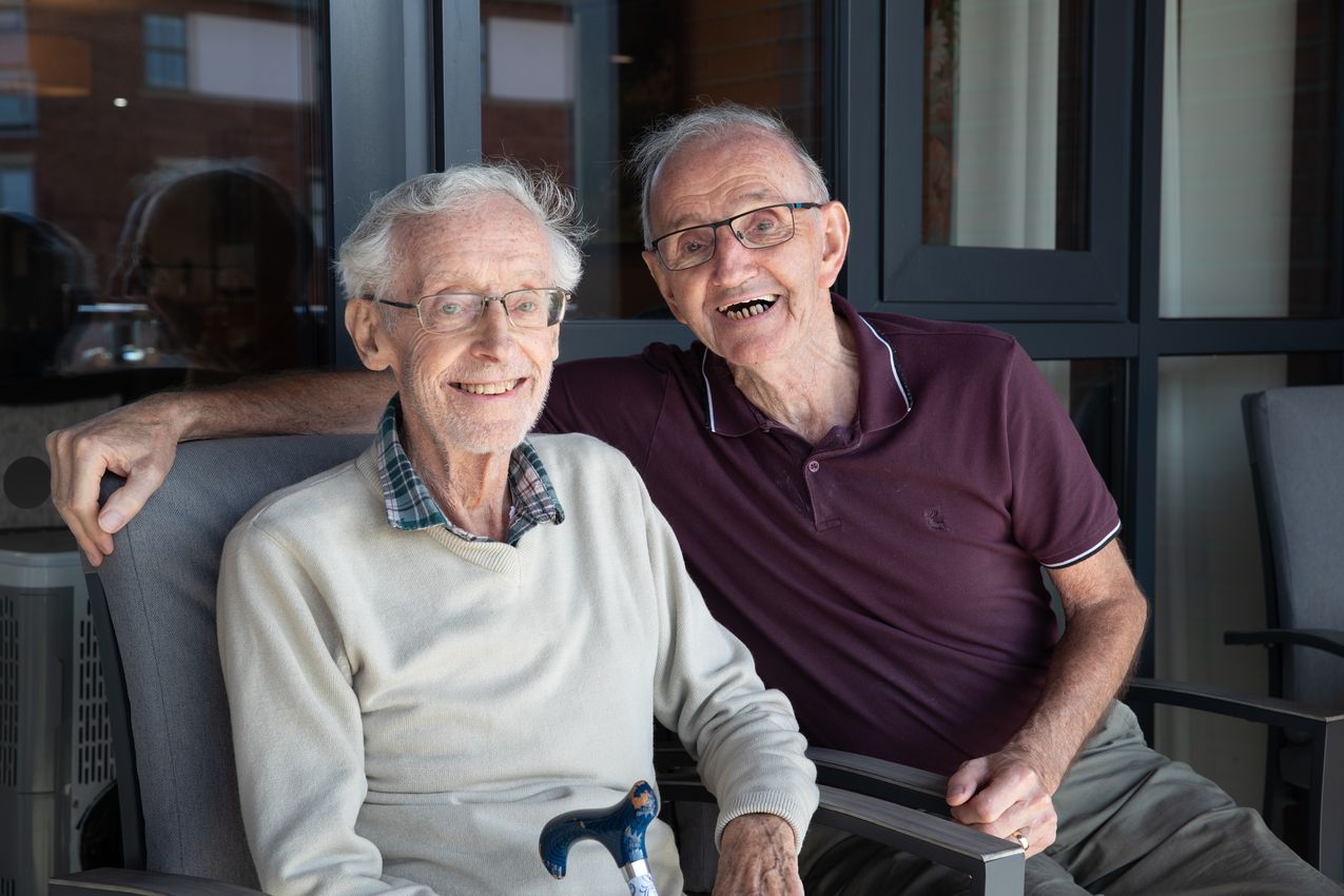 Belong Chester - Friends on the balcony