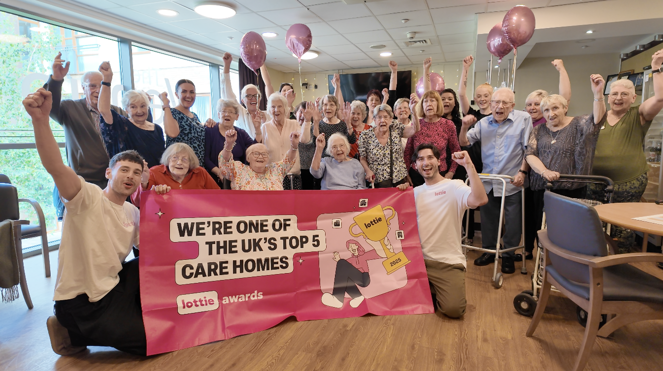  Pictured: Belong Wigan celebrates being a top UK care village with Lottie